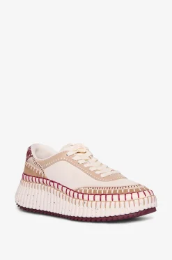Keilsneakers aus Leder und Stoff Nama
