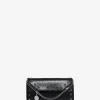 Nietenbesetzte Brieftasche mit Kettengurt aus Kunstwildleder Falabella Continental